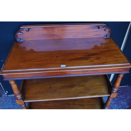 349 - Victorian mahogany buffet table with scroll pediment above three open tiers, on turned column suppor... 