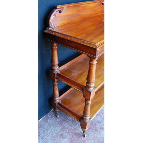 349 - Victorian mahogany buffet table with scroll pediment above three open tiers, on turned column suppor... 