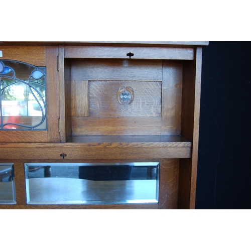 350 - Arts & Crafts oak dresser in the manner of Shapland & Petter of Barnstaple, retailed by B &a... 