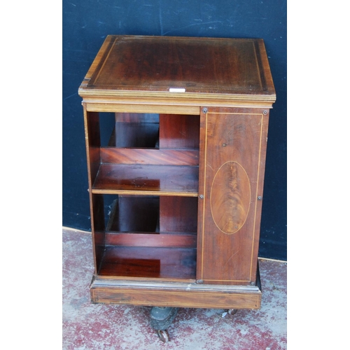 355 - Edwardian inlaid mahogany revolving bookcase with open divisions, on platform base with castors, 86c... 