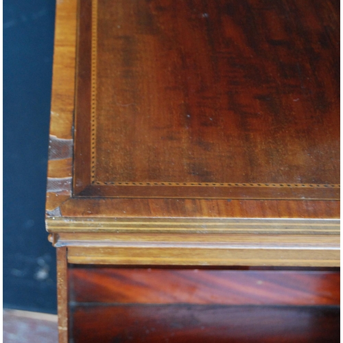 355 - Edwardian inlaid mahogany revolving bookcase with open divisions, on platform base with castors, 86c... 