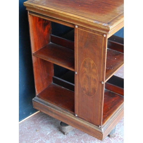 355 - Edwardian inlaid mahogany revolving bookcase with open divisions, on platform base with castors, 86c... 