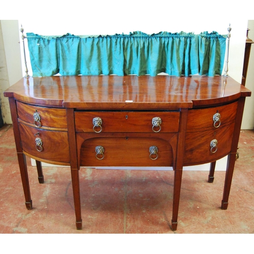 356 - George III Scottish mahogany sideboard of bowfront style with brass gallery rail above a short drawe... 