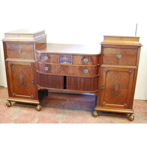 360 - Early 20th century Adams-style mahogany sideboard with two long drawers above tambour roller shutter... 