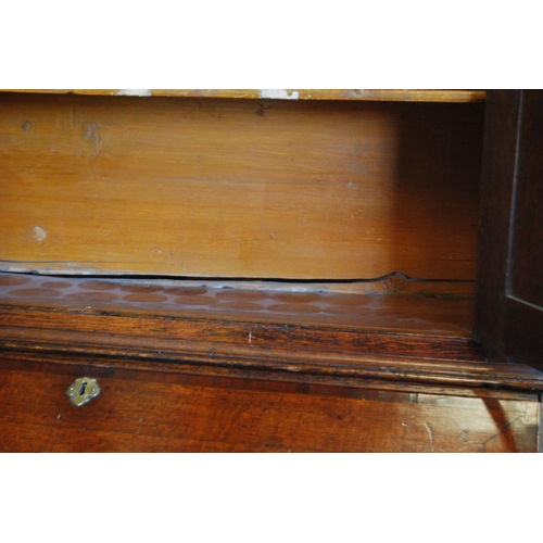 362 - 18th century and later oak and mahogany bureau cabinet, the top section with two panelled doors encl... 