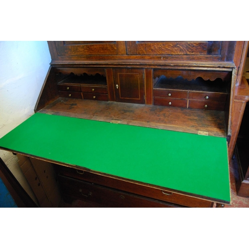 362 - 18th century and later oak and mahogany bureau cabinet, the top section with two panelled doors encl... 