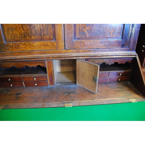 362 - 18th century and later oak and mahogany bureau cabinet, the top section with two panelled doors encl... 