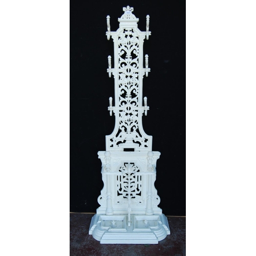 366 - Gothic inspired painted cast iron hall stand with a pierced scroll and fern frame with six pegs abov... 