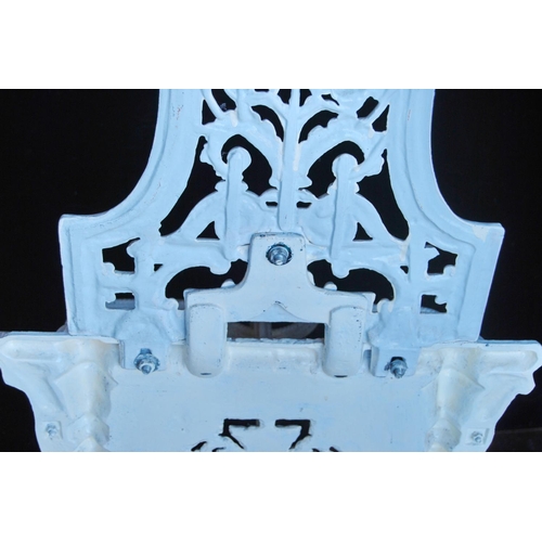 366 - Gothic inspired painted cast iron hall stand with a pierced scroll and fern frame with six pegs abov... 