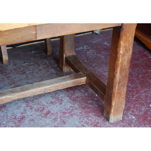 369 - Antique French oak refectory table, the fixed plank top with extending pull-out section to each end,... 