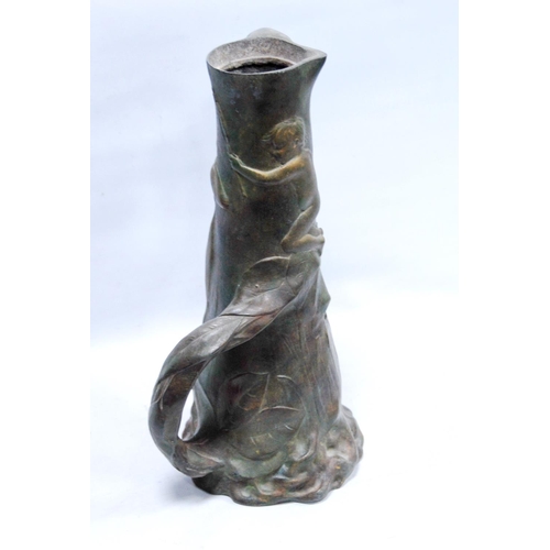 165 - Art Nouveau twin-handled pewter jug decorated with nude figures amongst the reeds, 32cm high.