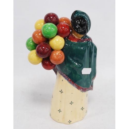 227 - Royal Doulton figure, 'The Balloon Seller' HN 583, no. 312-36, 22.5cm high.