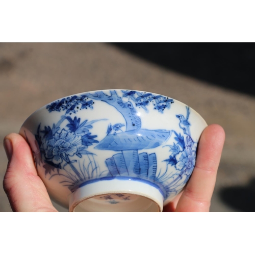 467 - Pair of Chinese blue and white antique bowls on carved hardwood stands, with four character mark to ... 