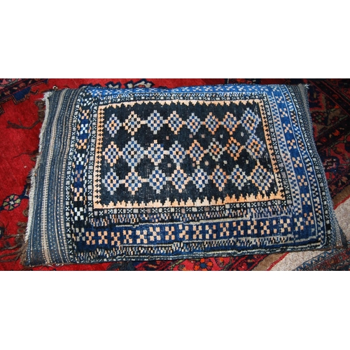 309 - Eastern saddle bag, 107cm x 54cm, a Qashqai-style two-section prayer mat and a cushion.  (3)