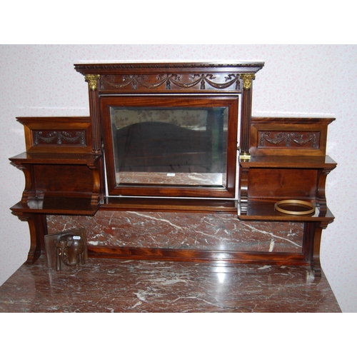 342 - Edwardian carved mahogany washstand, the rectangular mirror flanked by reeded columns with gilt capi... 