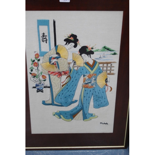 106 - Pair of modern Japanese-style embroideries of Geisha, both signed Michele.