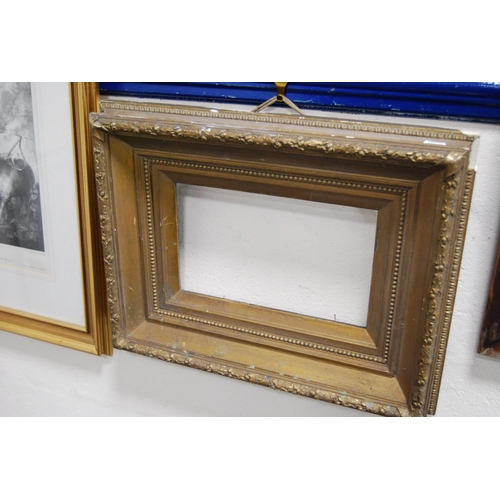 110 - Victorian print of the Grassmarket in Edinburgh, in a rosewood frame, gilt gesso picture frame and a... 