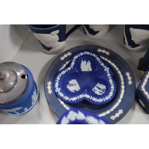 129 - Group of Wedgwood blue Jasper ware to include trefoil dishes, preserve pot and cover, trinket box, m... 