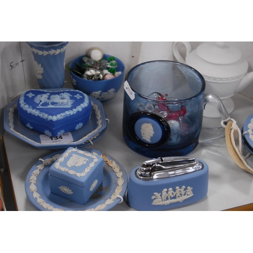 134 - Group of Wedgwood blue Jasper ware to include pin dishes, trinket boxes, lighter, spill vase, also a... 