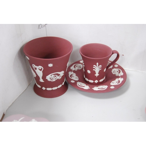 140 - Pink, claret and lilac-coloured Wedgwood Jasper ware to include spill vases, heart-shaped pin dishes... 