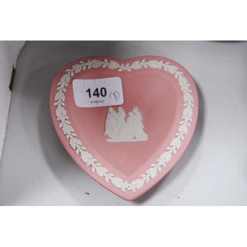 140 - Pink, claret and lilac-coloured Wedgwood Jasper ware to include spill vases, heart-shaped pin dishes... 