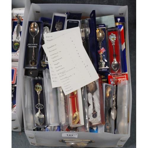 143 - Two cartons containing a large quantity of world souvenir spoons, all boxed.