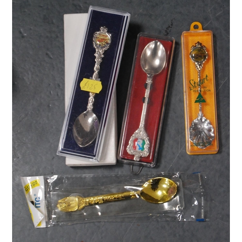 143 - Two cartons containing a large quantity of world souvenir spoons, all boxed.