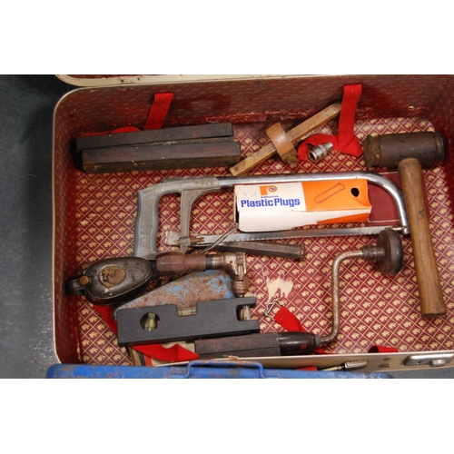 158 - Vintage suitcase containing cased socket set, saw, hammer, sharpening stone, spirit level etc.