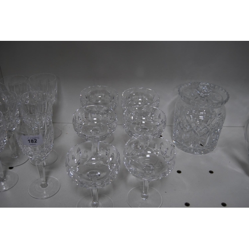 182 - Crystal and cut glass to include a Hoya thistle-decorated plate, two decanters, water jug, biscuit b... 