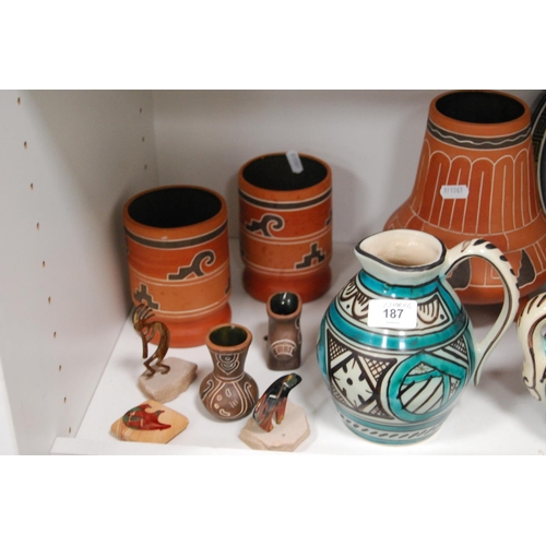 187 - Collection of Portuguese jugs, Greek plate, Mexican pottery, Colima-style jaguar water jug, and nati... 