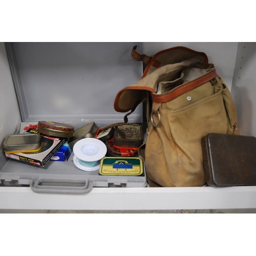 198 - Assorted tins of fishing flies, fishing bag and a box containing flies and spools etc (one shelf).