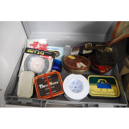 198 - Assorted tins of fishing flies, fishing bag and a box containing flies and spools etc (one shelf).