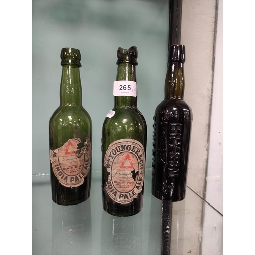 265 - Two empty green glass vintage bottles of William Younger India pale ale, bottled in Annan, and a dar... 