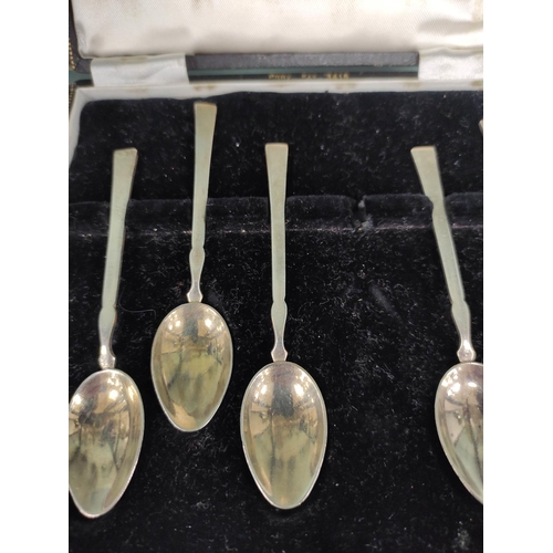 276 - Five matching silver coffee spoons, hallmarks for Birmingham, in a Harrods box.