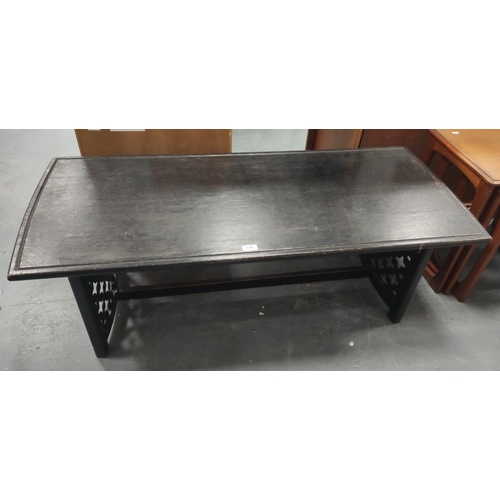 330 - Ebonised coffee table.