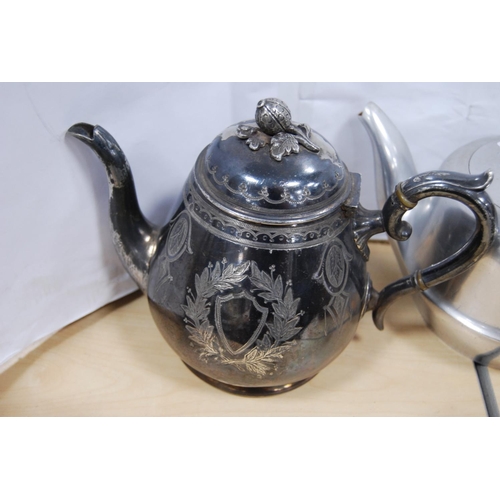 40 - Group of EP to include teapots, coffee pot, and a four-piece Picquot ware tea set.