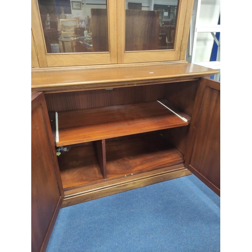 400 - Victorian-style two-door glazed bookcase on cupboard base.