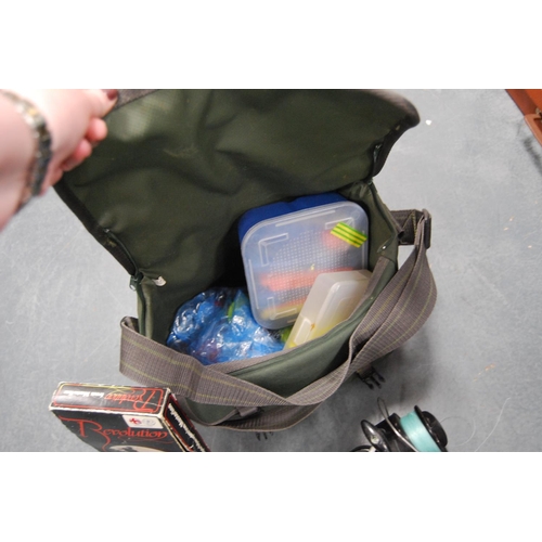 42 - Wychwood fishing bag containing Jumbo AF50 boat reel, Garcia Mitchell 386 reel and various other acc... 