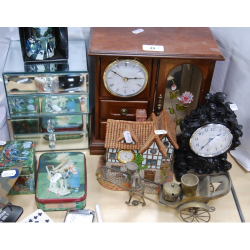 49 - Glass toilet bottle, mantel clock, tins, Beatles Abbey Road mug, another Beatles mug in a tin, orien... 