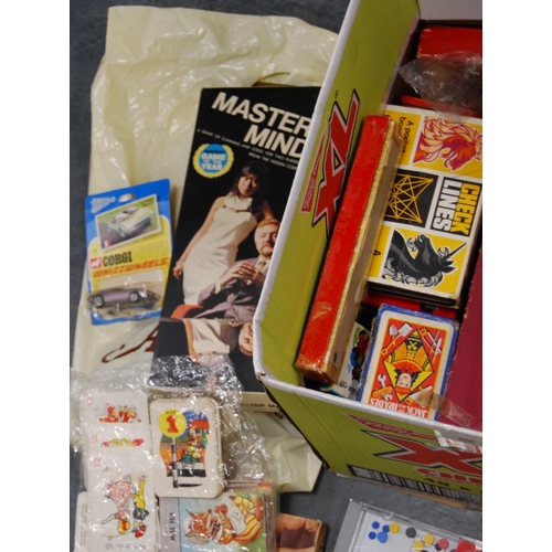 69 - Carton of various children's games and playing cards to include Monopoly, Beetle, Mastermind, Lexico... 