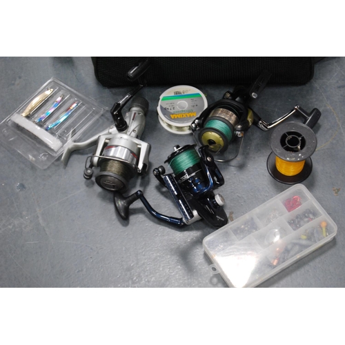 91 - Leeda fishing bag containing a large quantity of accessories to include Jarvis Walker reel, Daiwa Lo... 