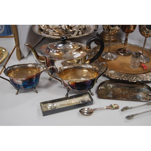 98 - EP to include a cake basket, bread board in plated mount, goblets, fish dividers, three-piece tea se... 