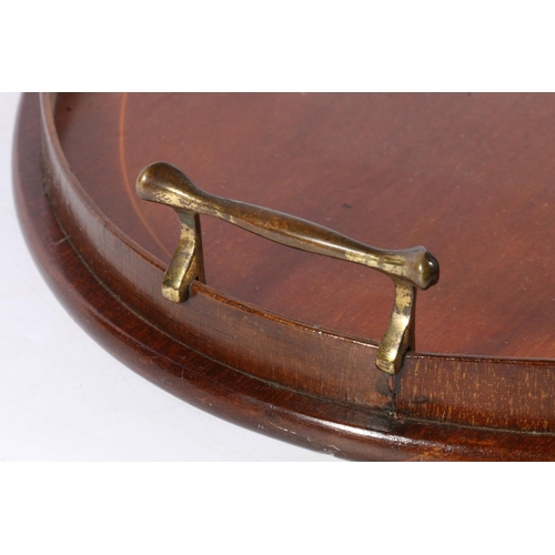 102 - Edwardian mahogany and inlaid twin handled tray with raised gallery of oval shape, 60cm long. 