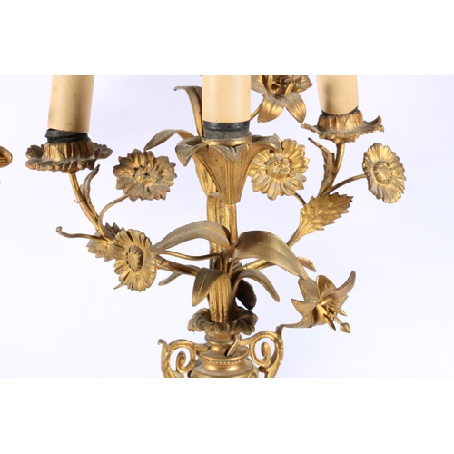 178 - Pair of French gilt metal, ormolu style four-branch table lamps modelled as an urn of flowers raised... 