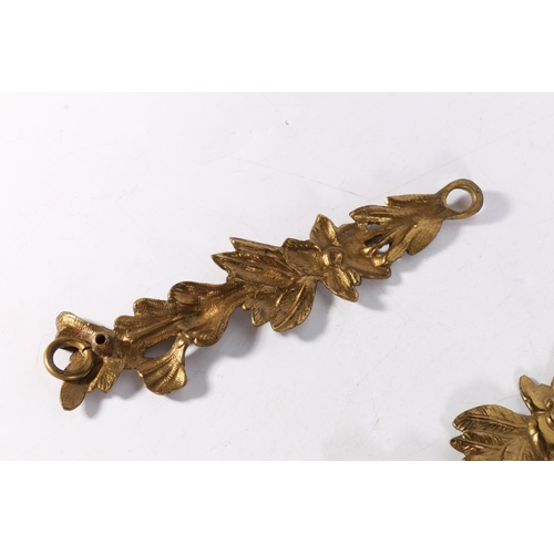 179 - Six French style gilded cast metal curtain tie backs? 17.5cm long.