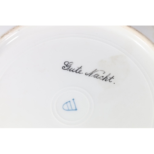 182 - Pair of Vienna porcelain cabinet plates, titled 'Gute Nacht' and 'Lisette', blue beehive mark to the... 