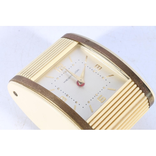 197 - Vintage Westclox cream plastic cased Art Deco style bedside clock with tambour style case, 9cm long.