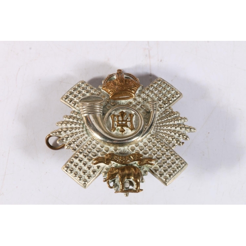 243 - Items related to Corporal Paddy Carey of the Highland Light Infantry to include a silver metal Highl... 