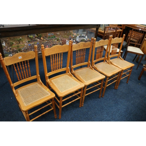 575 - Set of six carved and spindle back dining chairs with bergere seats.