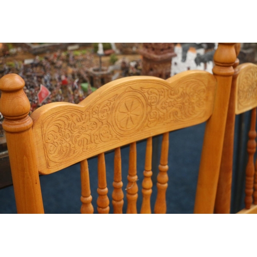 575 - Set of six carved and spindle back dining chairs with bergere seats.